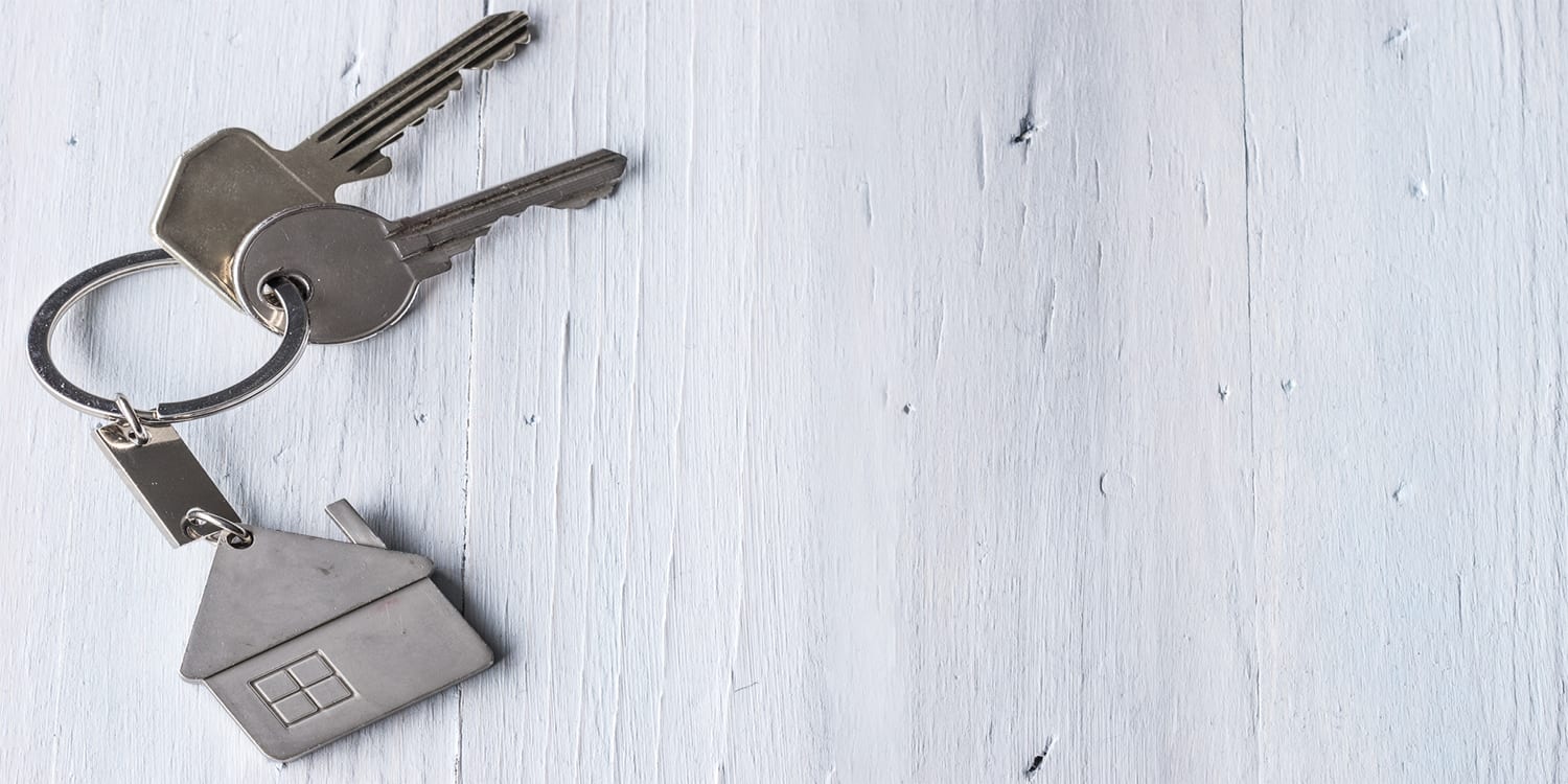 House keys on a table, foreclosure concept